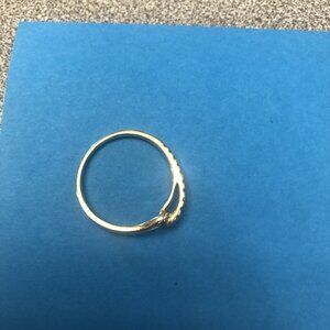 10k gold and 1/10 genuine diamond ring; size 7